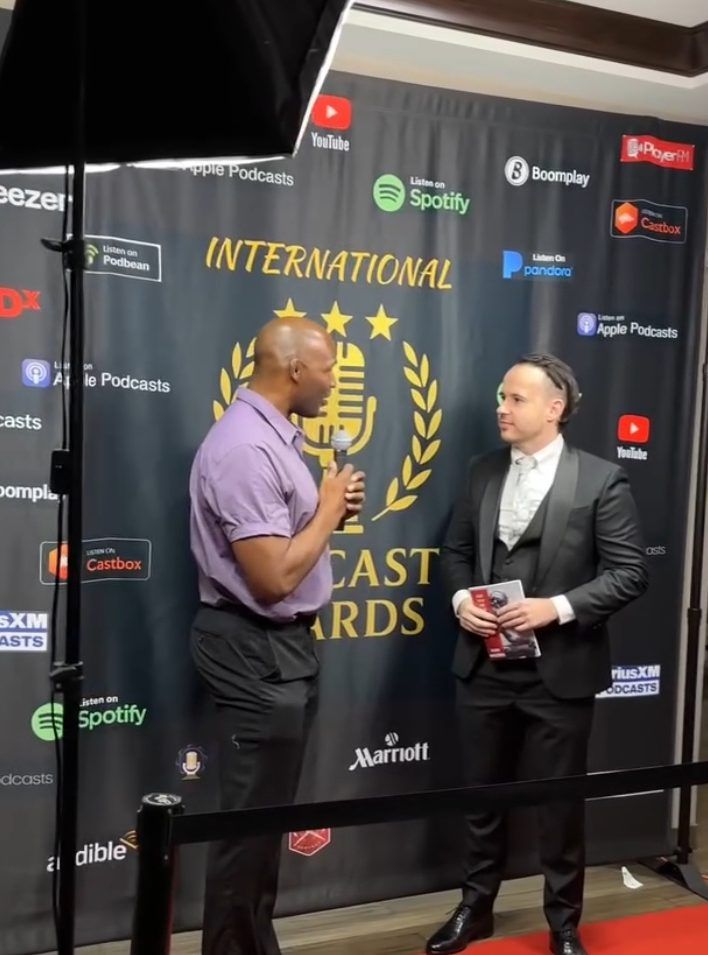 Kain on the red carpet at the International Podcast Awards 2025